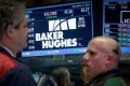 Baker Hughes to halt buybacks, awaits GE plans