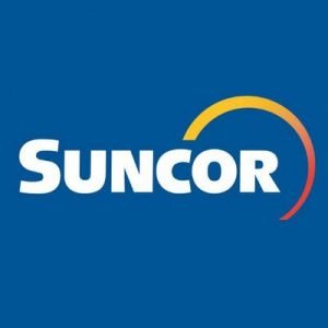 Suncor reports quarterly loss from year-ago profit