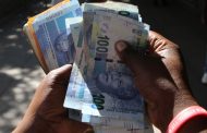 South African rand edges lower after strong week